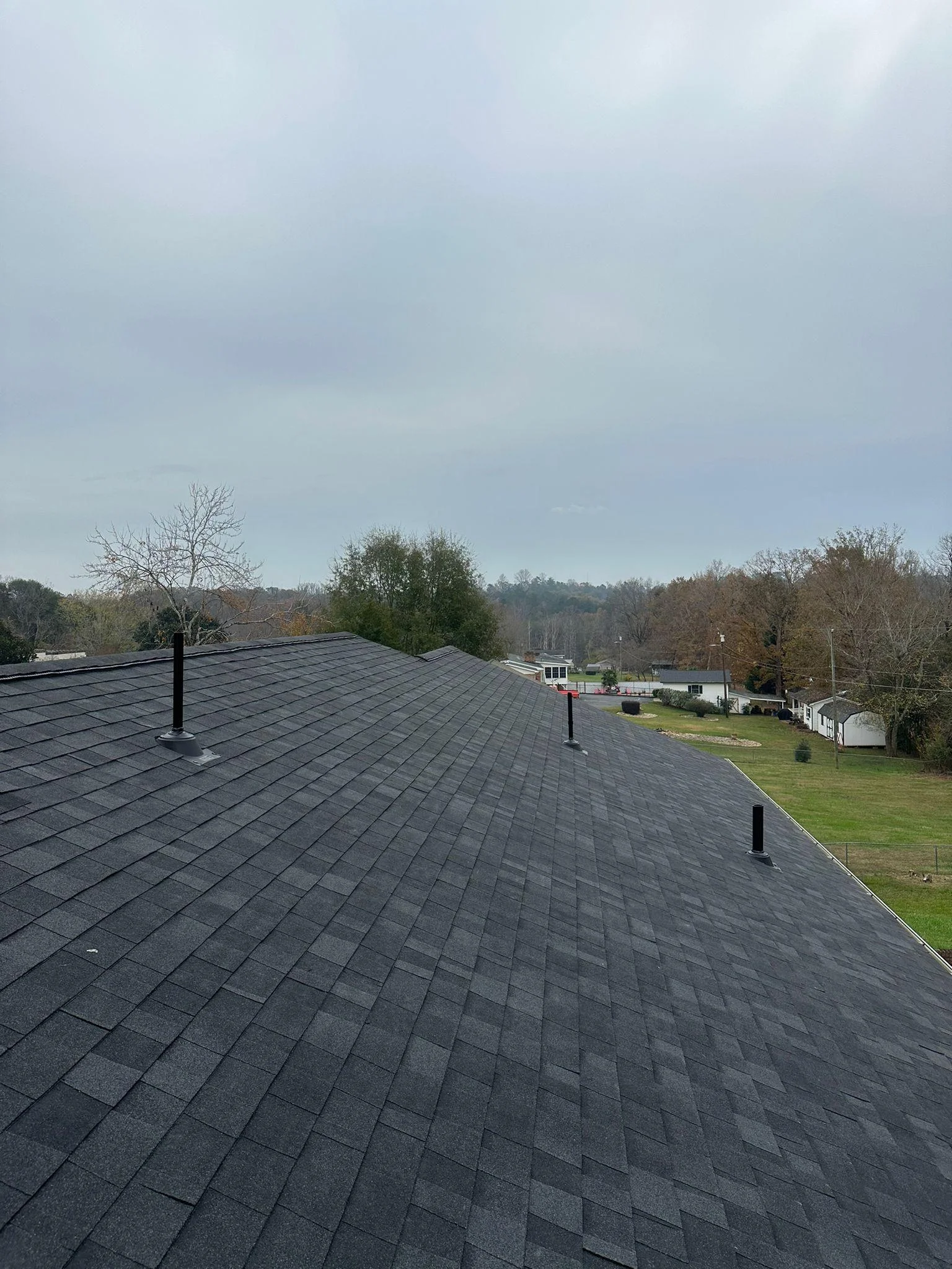 Crew at work on roofing section